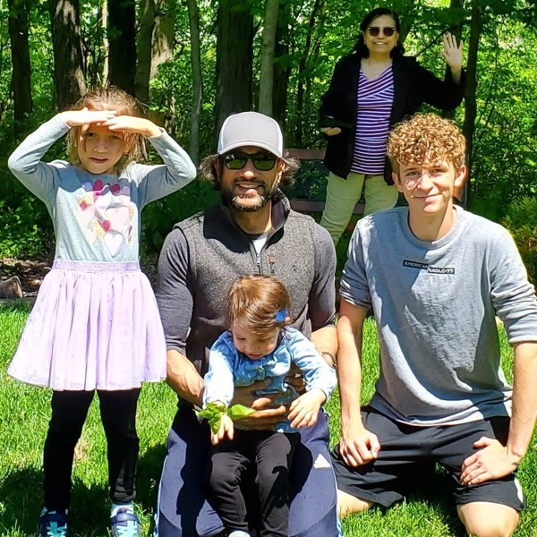 Jit with his kids and grandma in the background